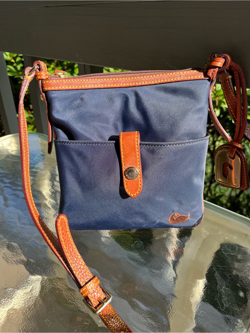 Dooney & Bourke Navy and Brown Leather Crossbody Bag